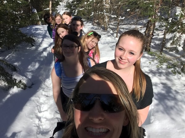Profile students snowshoeing